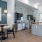 large kitchen area with tvs