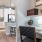 a small office with desk and chair