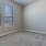 bedroom with carpet and window